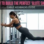 Woman in a gym performing cable kickbacks with an ankle strap to build the upper glute shelf.